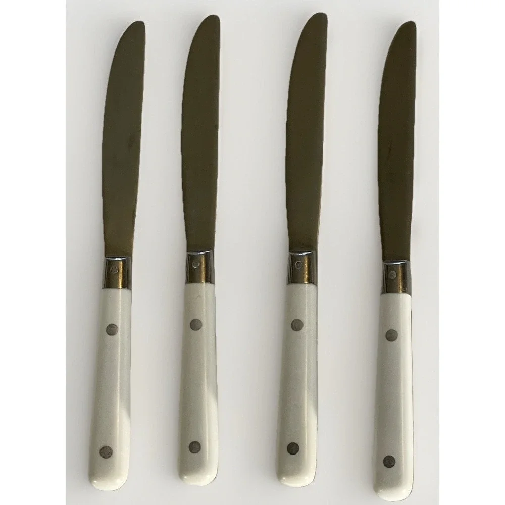 4 Carnival White Handle Dinner Knives Stainless Flatware Korea 3‎ Rivets